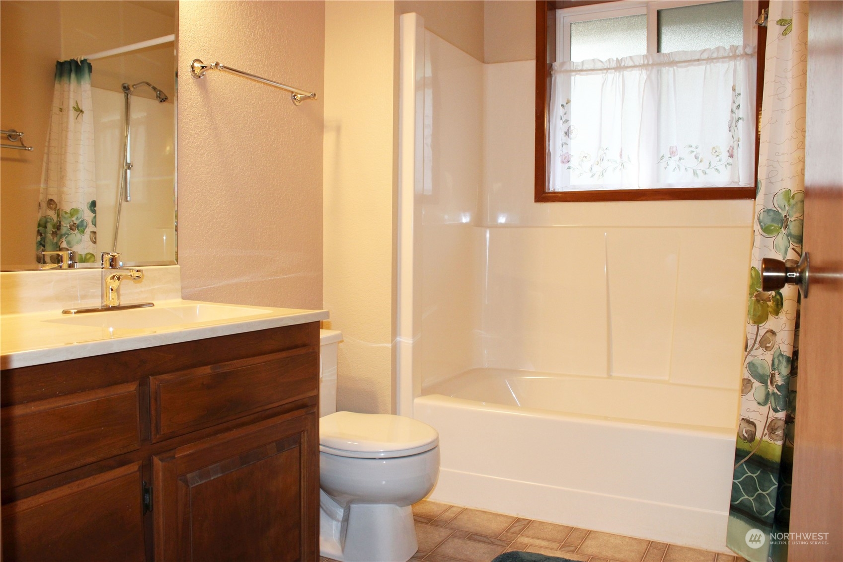 365 Dungeness Meadows Sequim, WA 98382 - Photo 15 of 28 a bathroom with a sink a toilet and shower