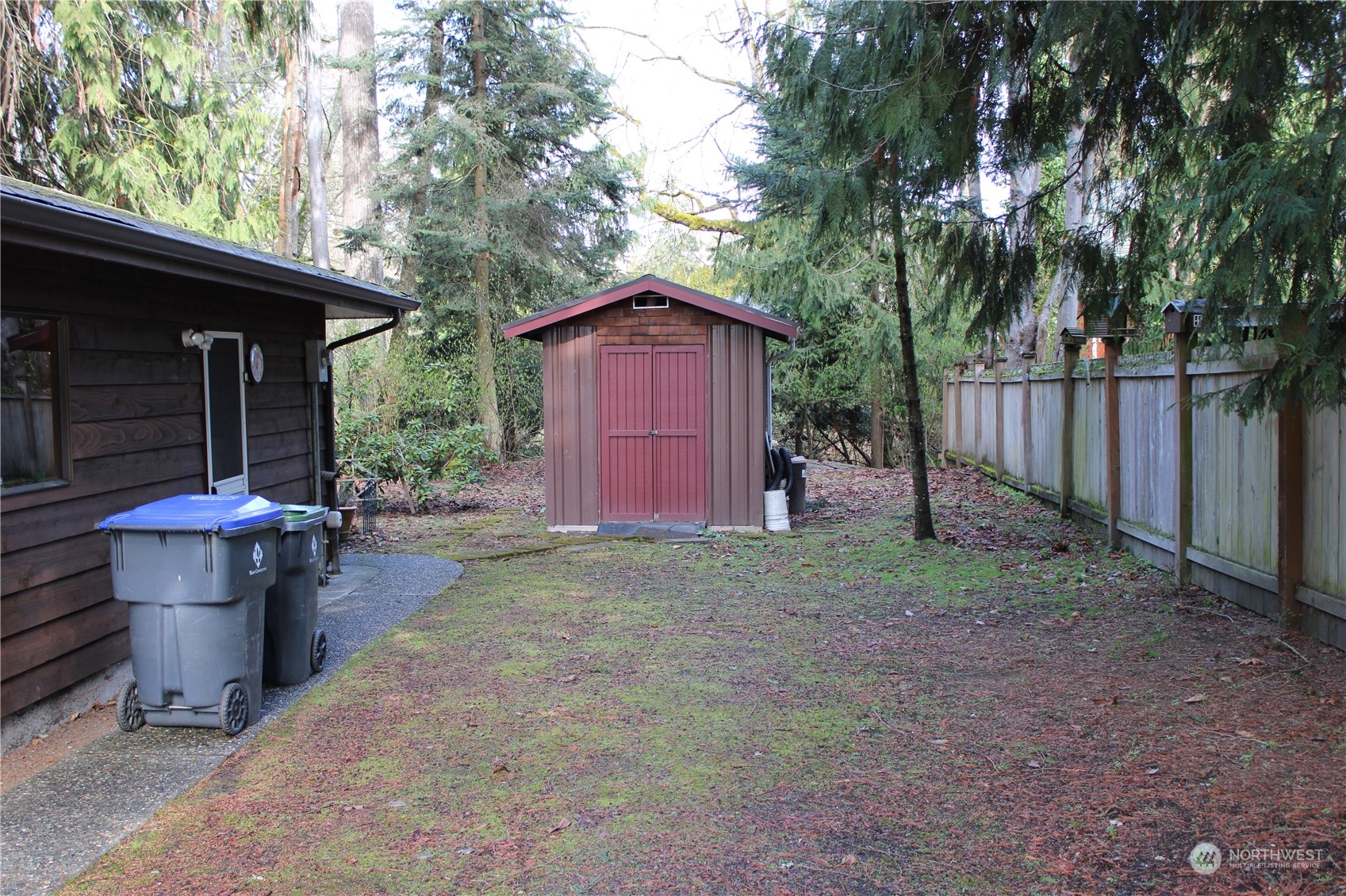 365 Dungeness Meadows Sequim, WA 98382 - Photo 21 of 28 a view of a small house with a yard and large tree