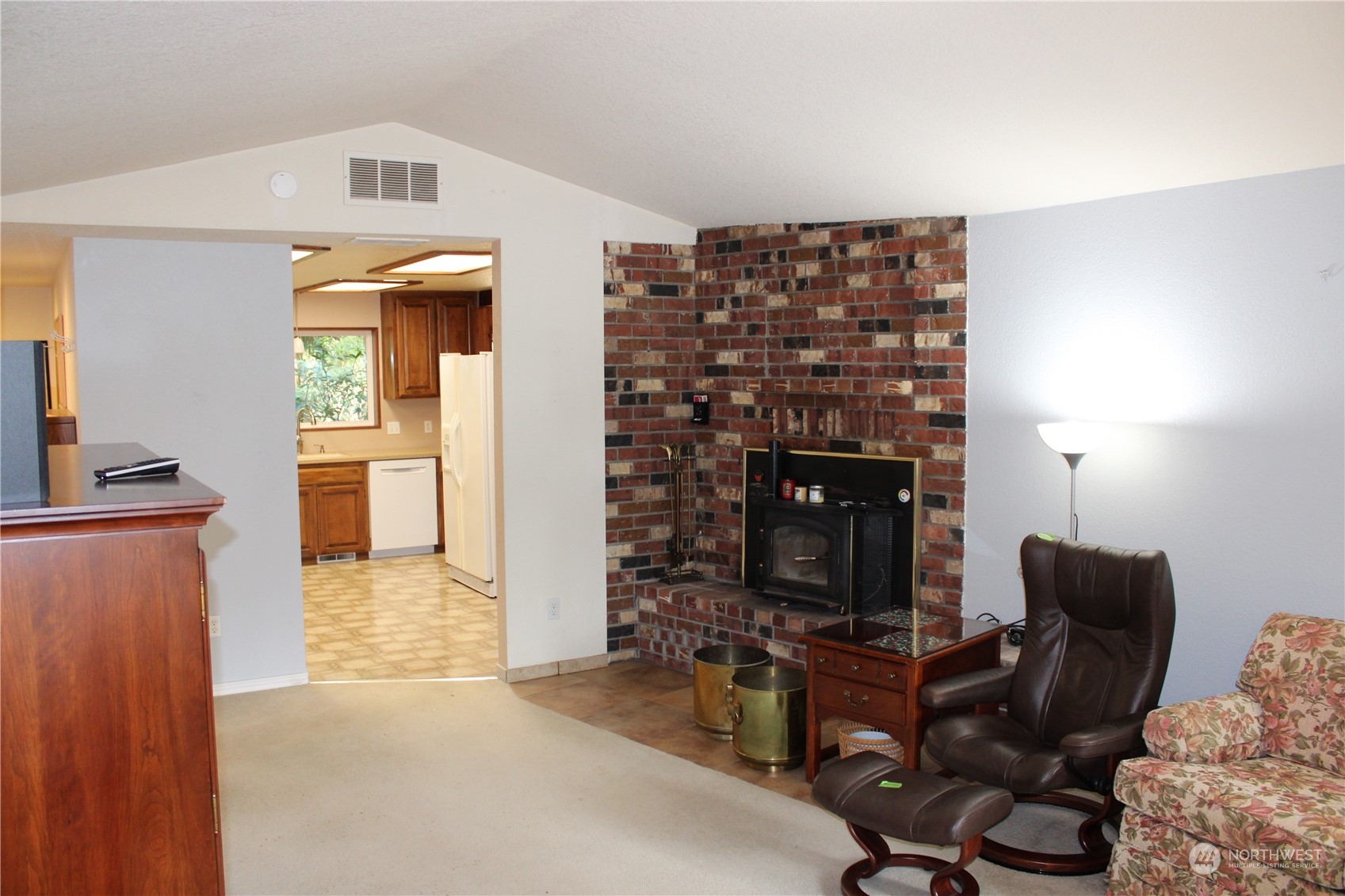 365 Dungeness Meadows Sequim, WA 98382 - Photo 5 of 28 a living room with furniture and a fireplace