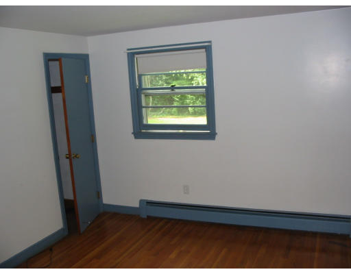 119 Prentice Road Northbridge, MA 01588 - Photo 7 of 9 a view of an empty room and window