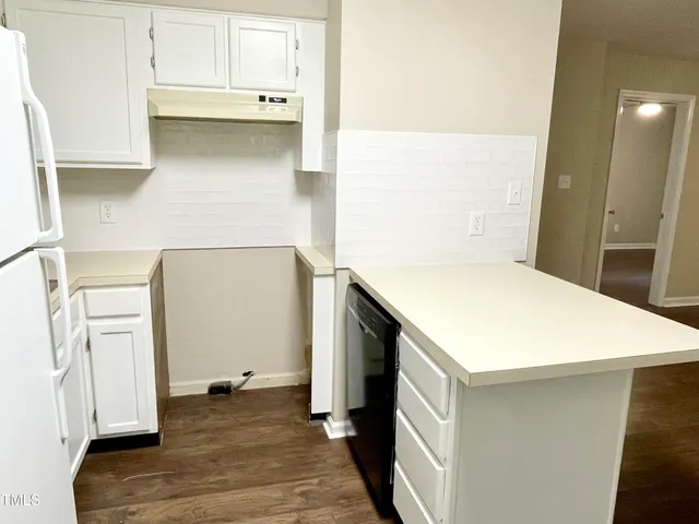 a view of kitchen and utility room