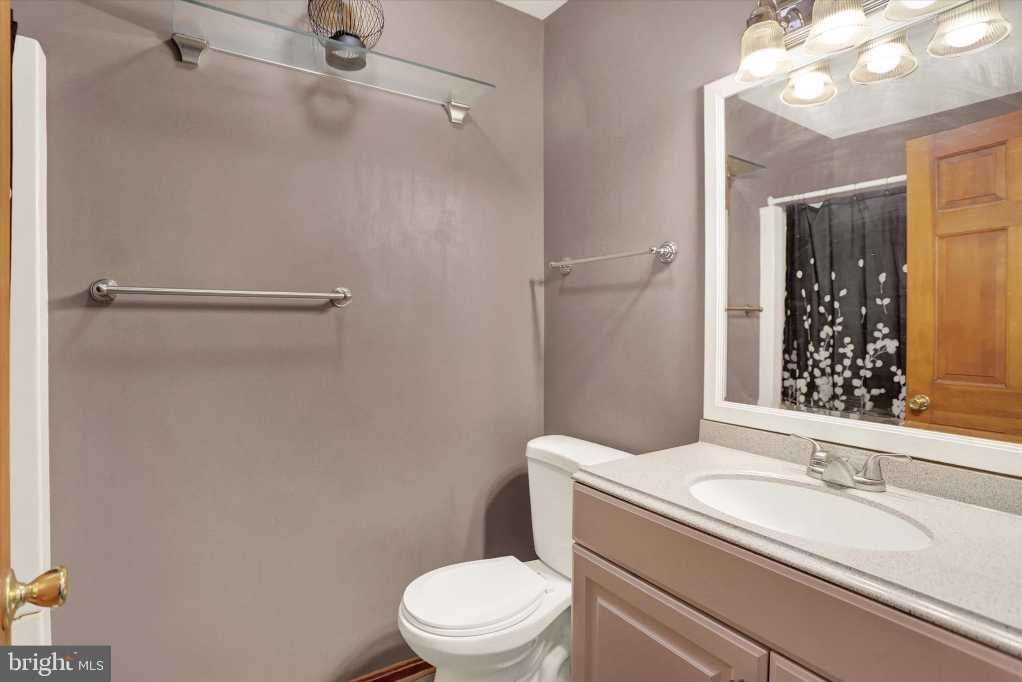 405 Clover Road Etters, PA 17319 - Photo 17 of 50 a white toilet sitting next to a bathroom sink