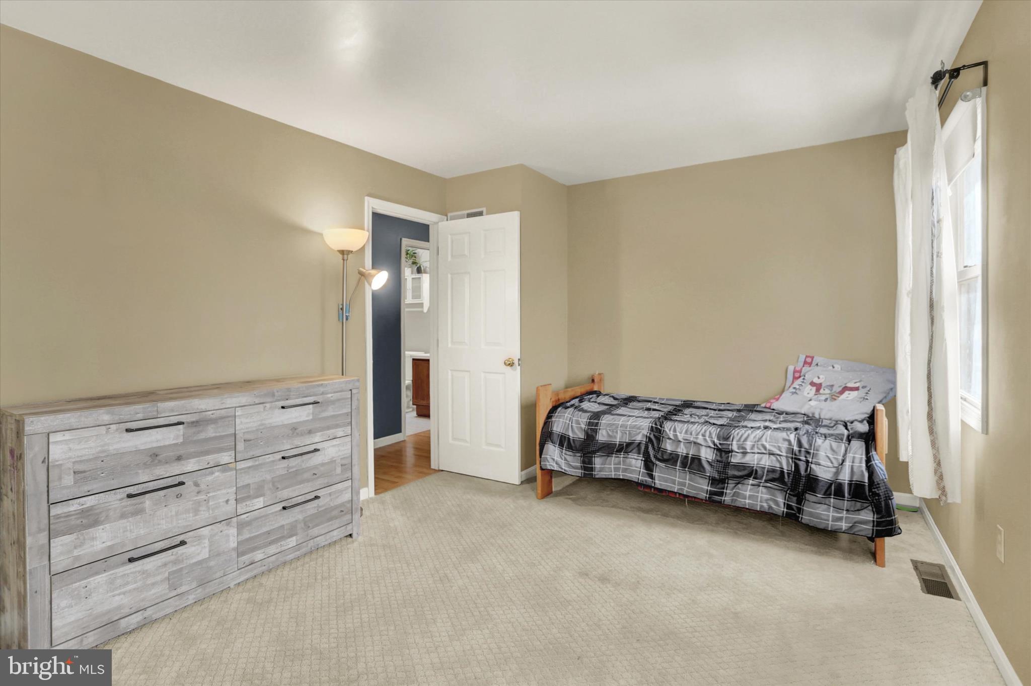 405 Clover Road Etters, PA 17319 - Photo 30 of 50 a bedroom with a bed and a cabinets