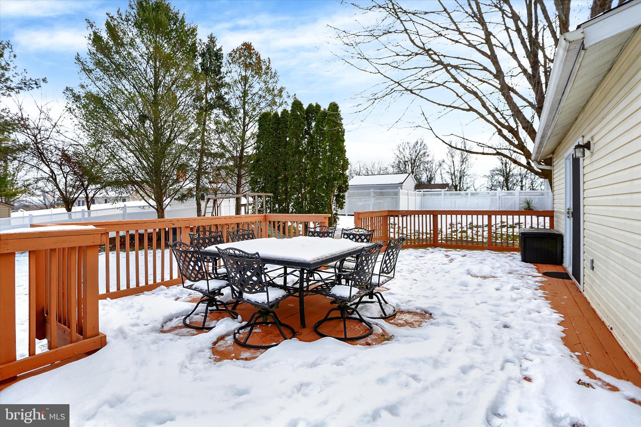405 Clover Road Etters, PA 17319 - Photo 43 of 50 a view of a chairs and table in the patio