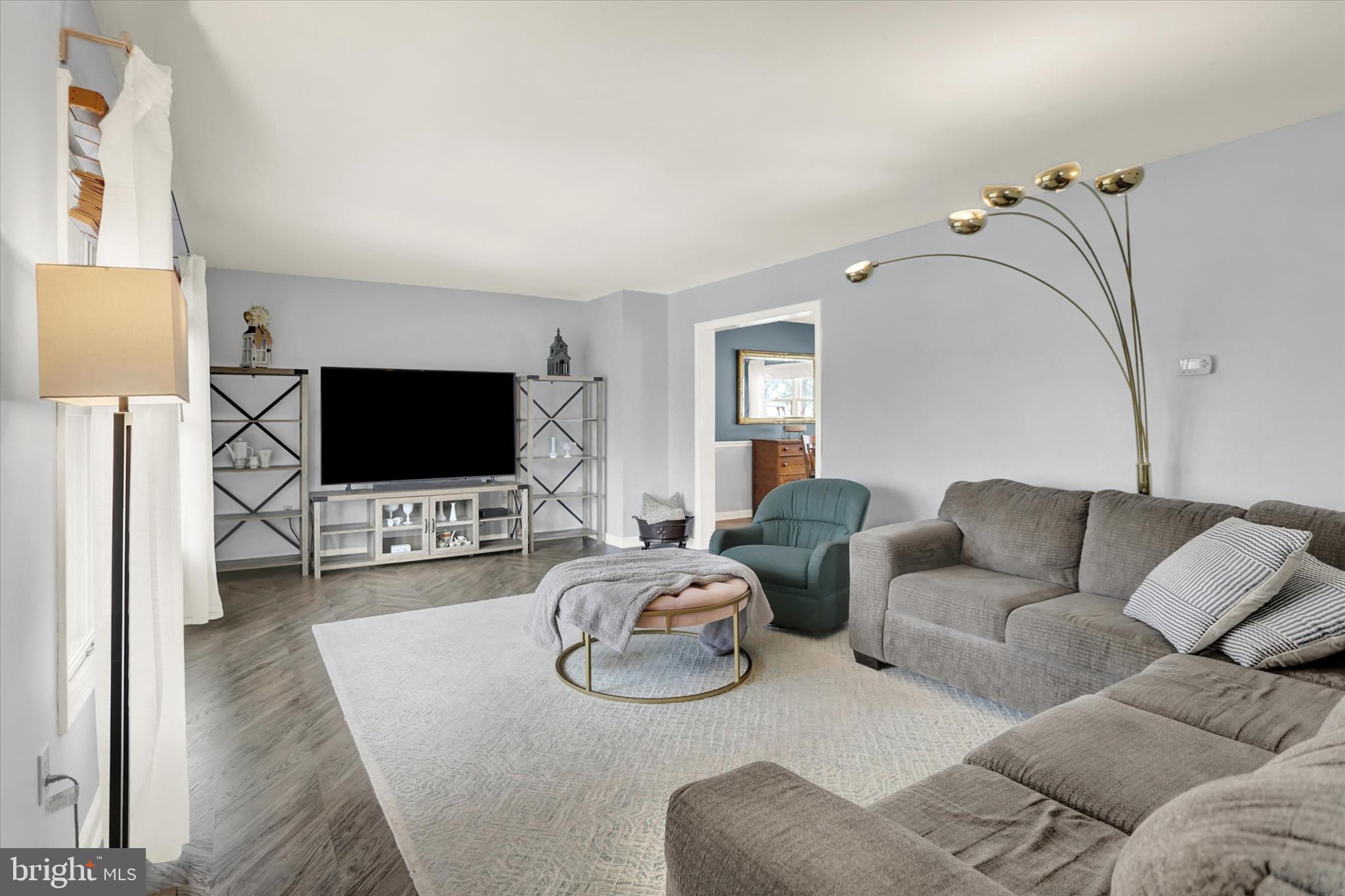 405 Clover Road Etters, PA 17319 - Photo 5 of 50 a living room with furniture and a flat screen tv