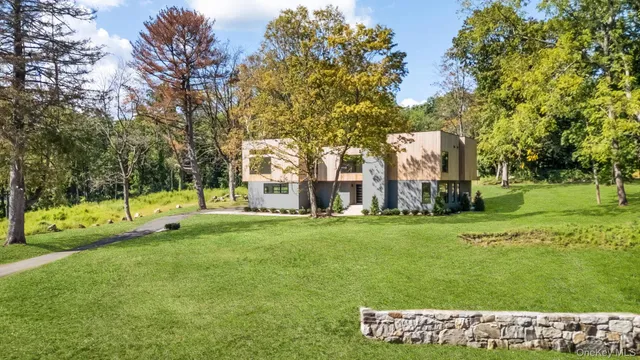 a view of a park with large trees