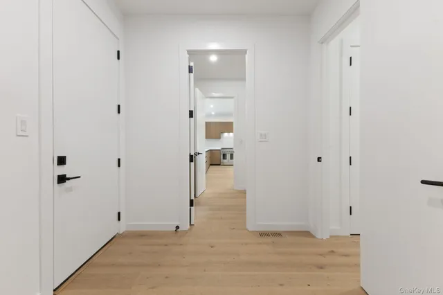 a view of a kitchen with a sink