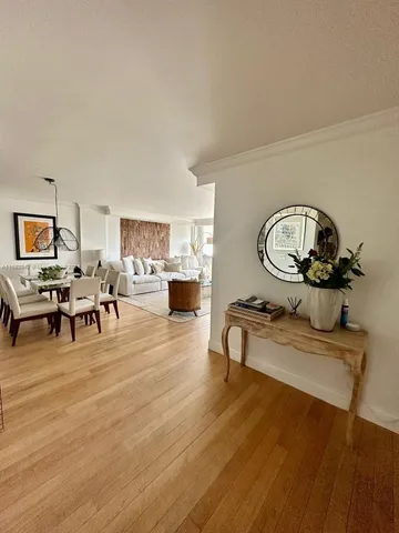 a room with furniture and wooden floor