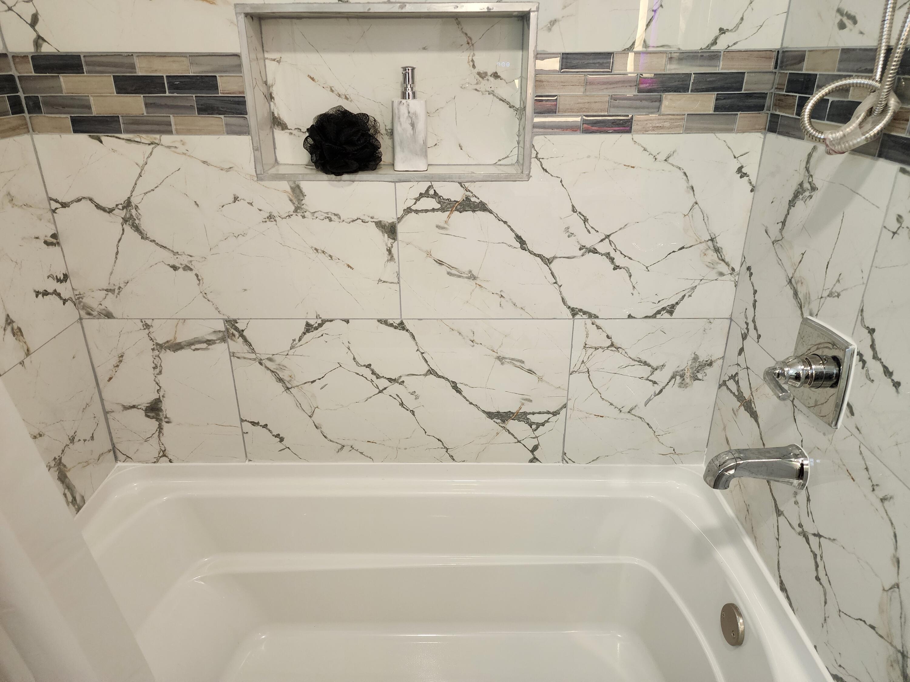 851 Johnson Street Gary, IN 46402 - Photo 12 of 24 a bathroom with a bathtub and shower