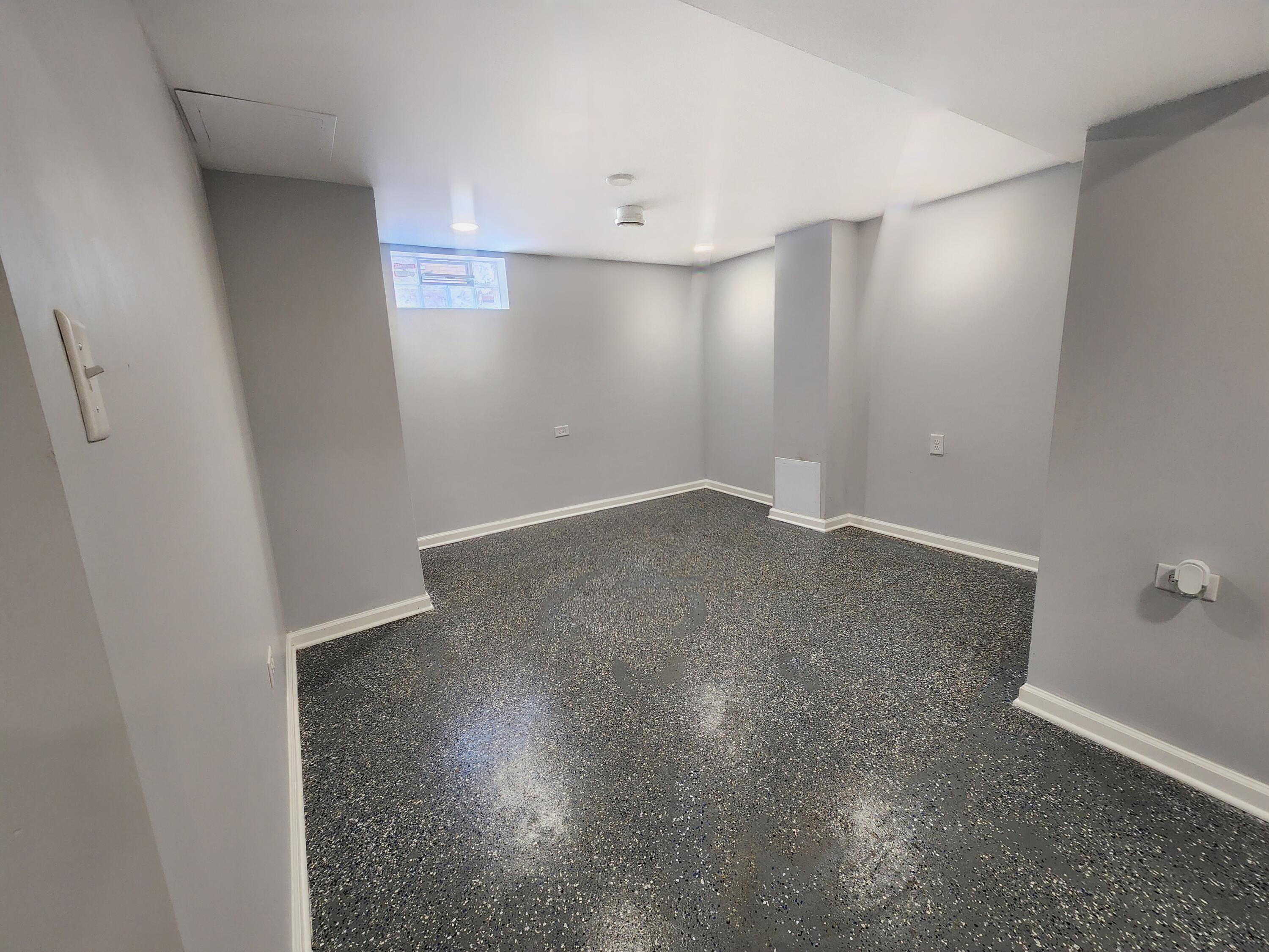 851 Johnson Street Gary, IN 46402 - Photo 13 of 24 an empty room with a empty space and windows