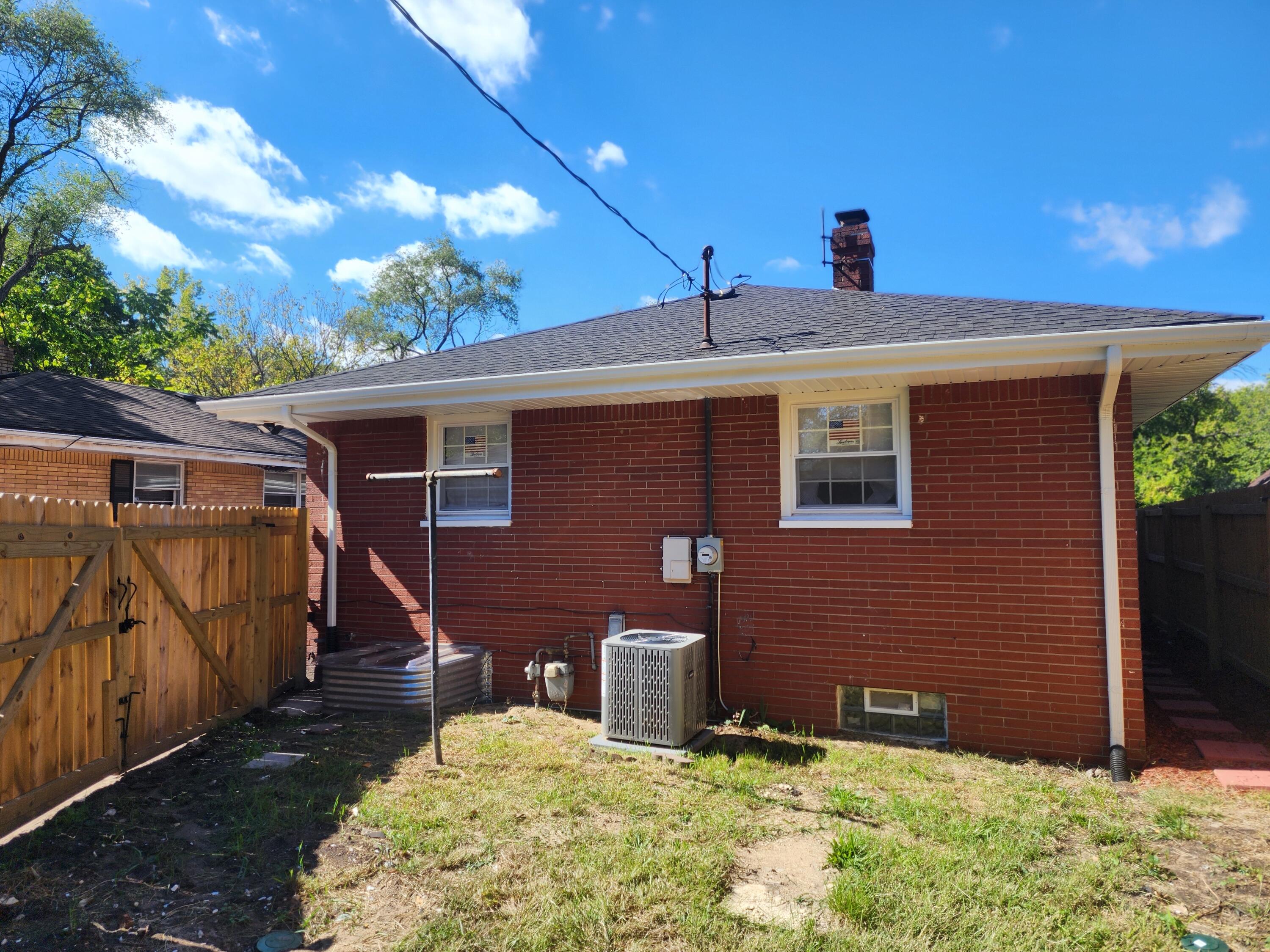 851 Johnson Street Gary, IN 46402 - Photo 21 of 24 a front view of house with yard