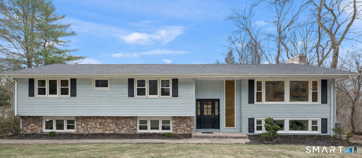252 Blue Ridge Drive Manchester, CT 06040 - Photo 1 of 40 Expanded raised ranch with updated exterior, new driveway, and exceptional garage/workshop capacity.