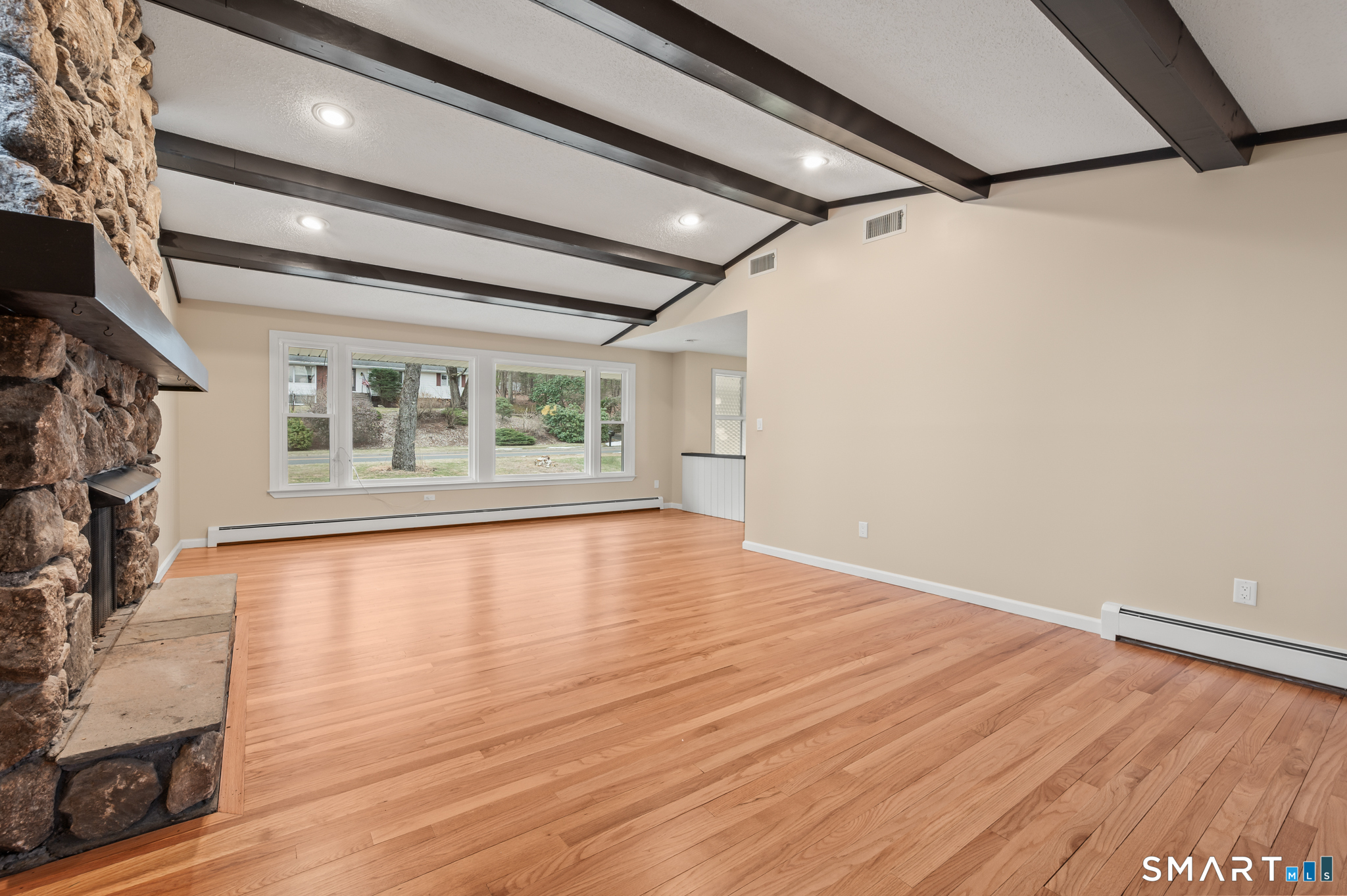 252 Blue Ridge Drive Manchester, CT 06040 - Photo 11 of 40 Expansive living space uncommon for raised ranch design.