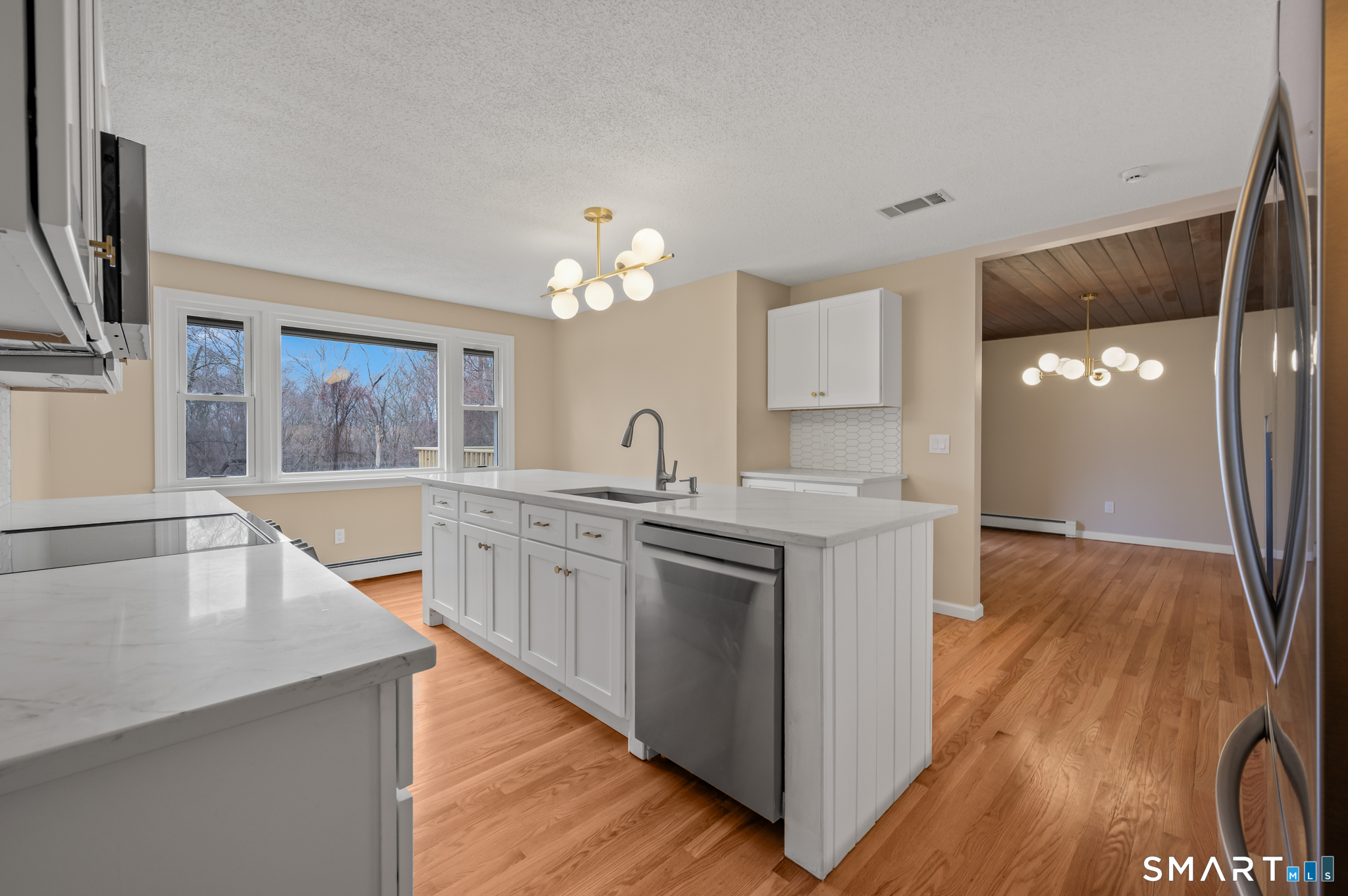 252 Blue Ridge Drive Manchester, CT 06040 - Photo 12 of 40 Additional angle highlighting cabinetry, lighting, and workspace.