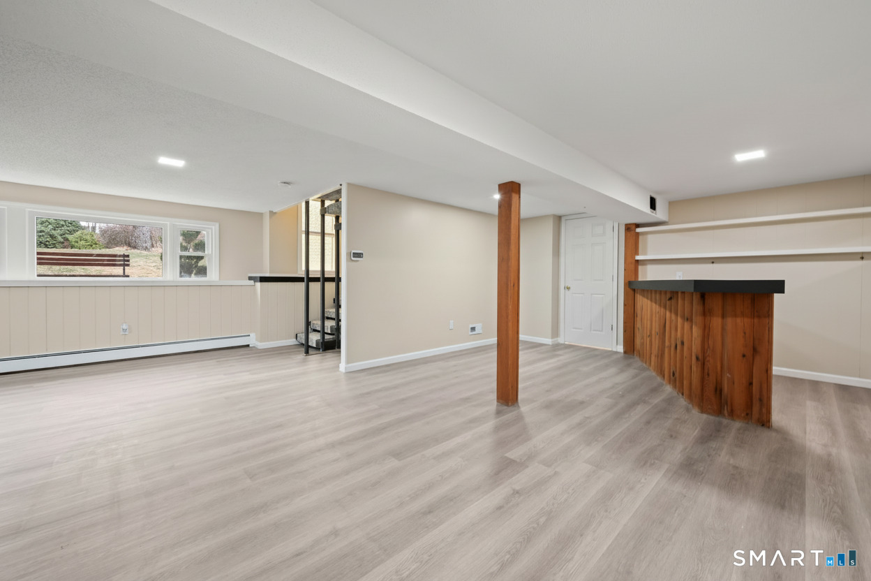 252 Blue Ridge Drive Manchester, CT 06040 - Photo 16 of 40 Finished walk-out lower level offering additional living space.