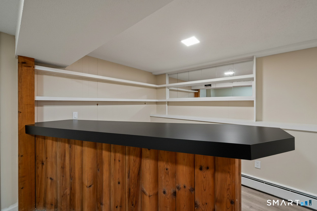 252 Blue Ridge Drive Manchester, CT 06040 - Photo 18 of 40 Built-in bar area ideal for entertaining or recreation space.