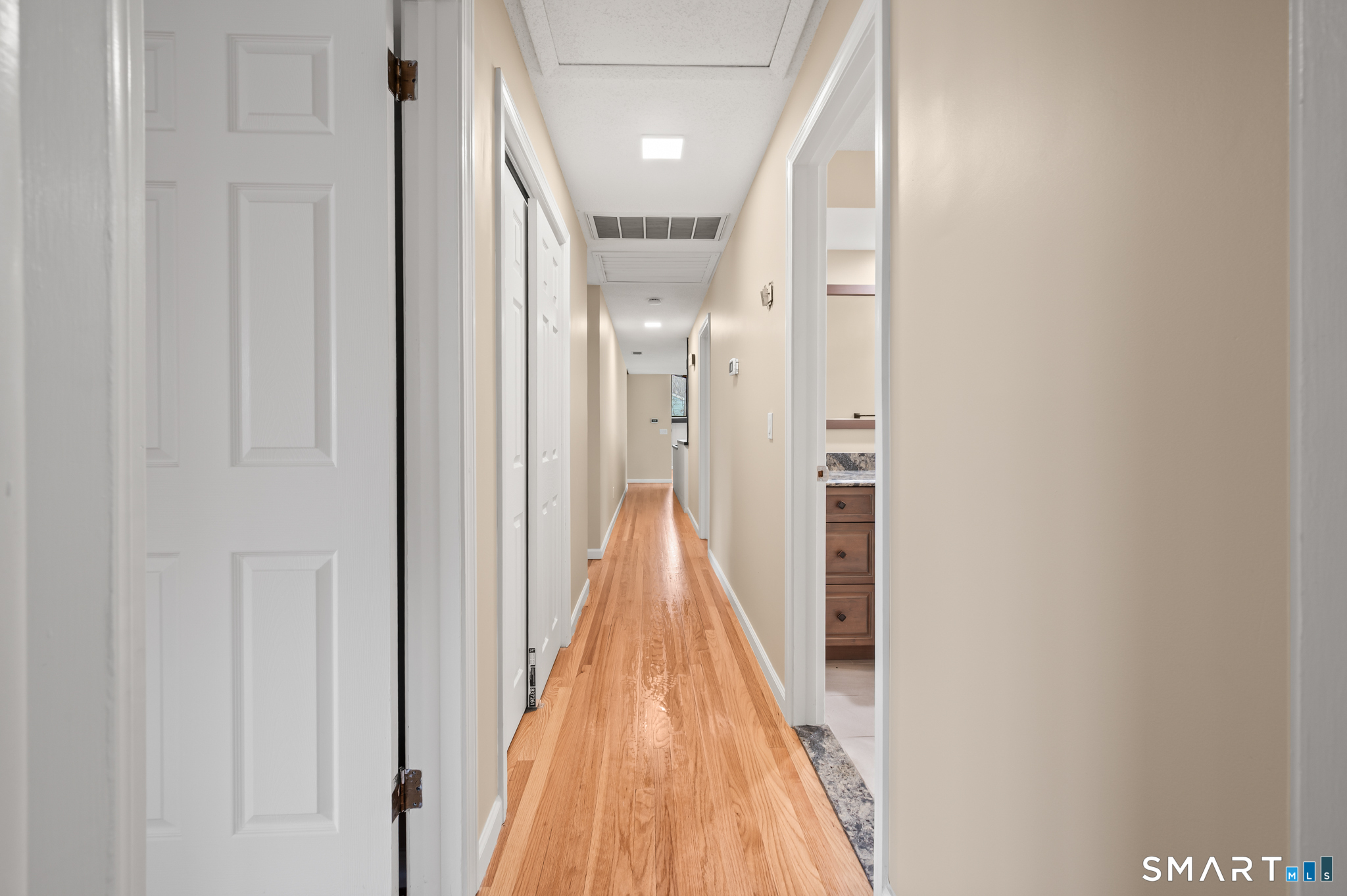 252 Blue Ridge Drive Manchester, CT 06040 - Photo 19 of 40 Interior hallway connecting bedrooms and living areas.