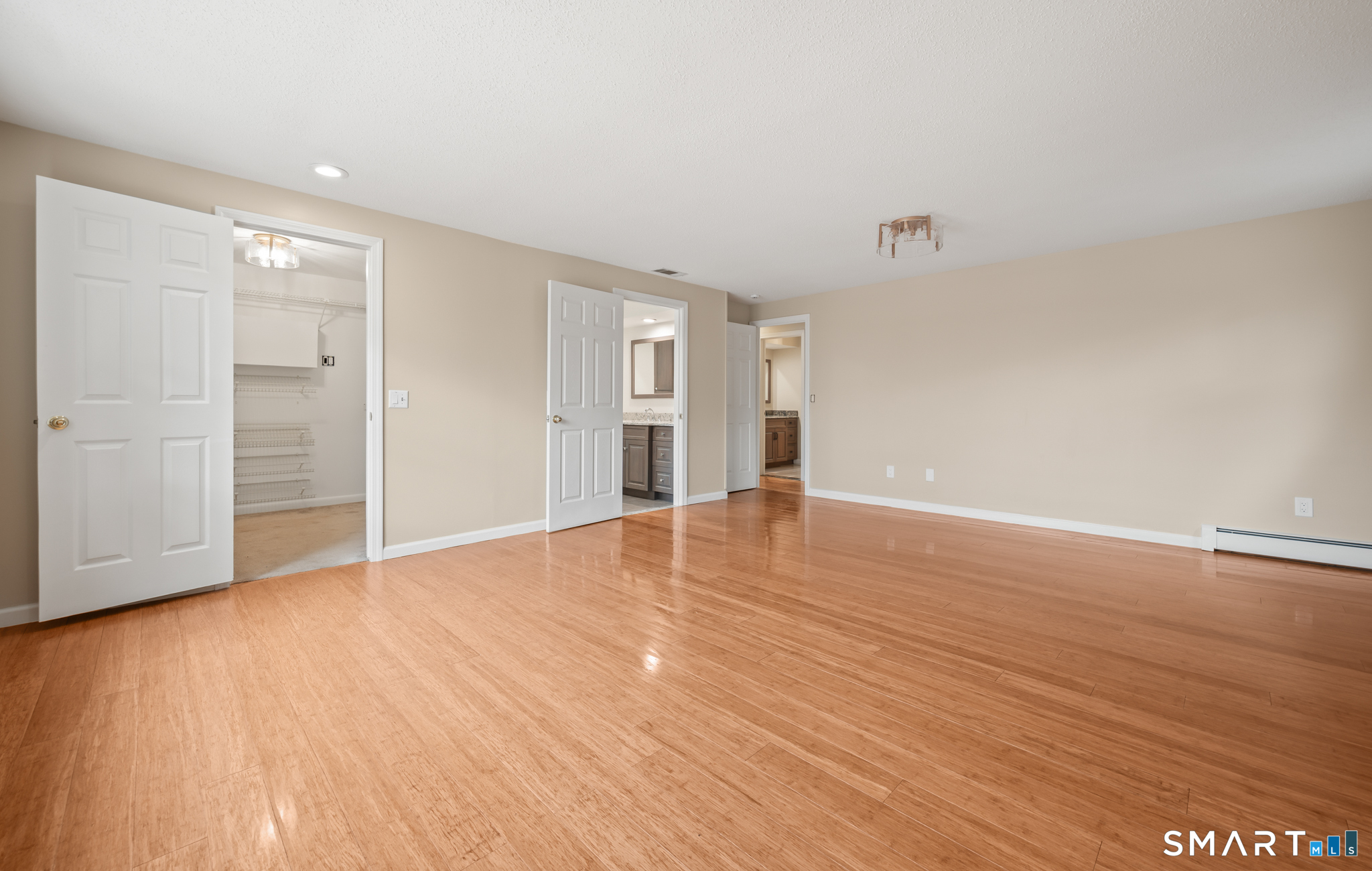 252 Blue Ridge Drive Manchester, CT 06040 - Photo 21 of 40 Primary bedroom with walk in closet an ensuite bathroom.