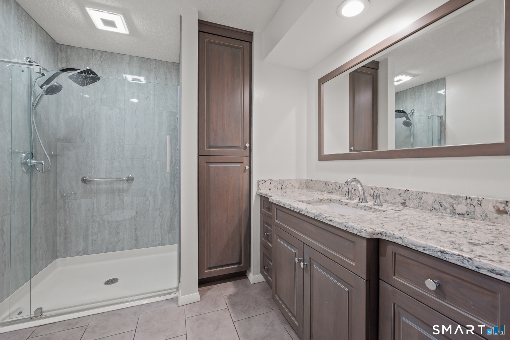 252 Blue Ridge Drive Manchester, CT 06040 - Photo 23 of 40 Updated bathroom with ambient heated floor, modern finishes and rainfall shower head.