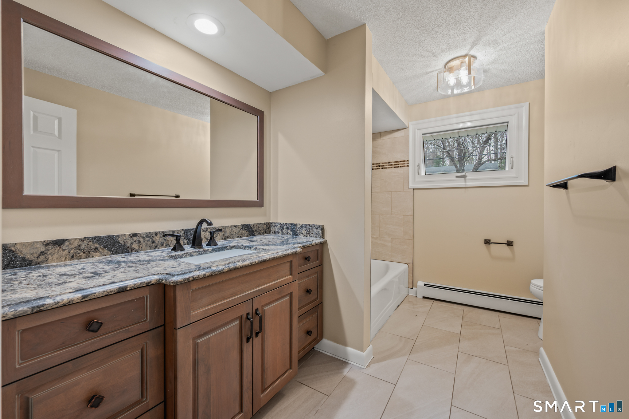 252 Blue Ridge Drive Manchester, CT 06040 - Photo 26 of 40 Updated full bathroom with tile shower.