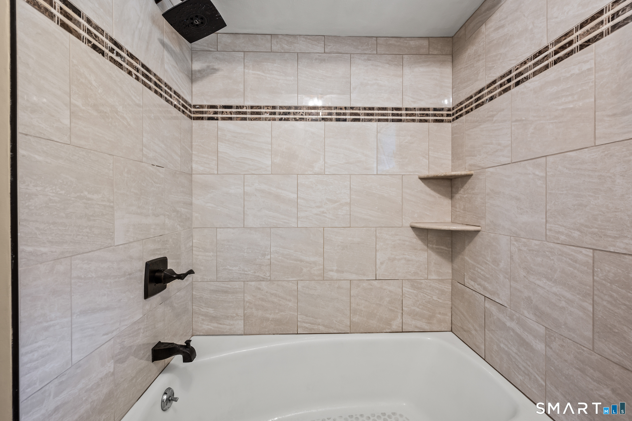 252 Blue Ridge Drive Manchester, CT 06040 - Photo 27 of 40 Shower detail with updated tile surround.