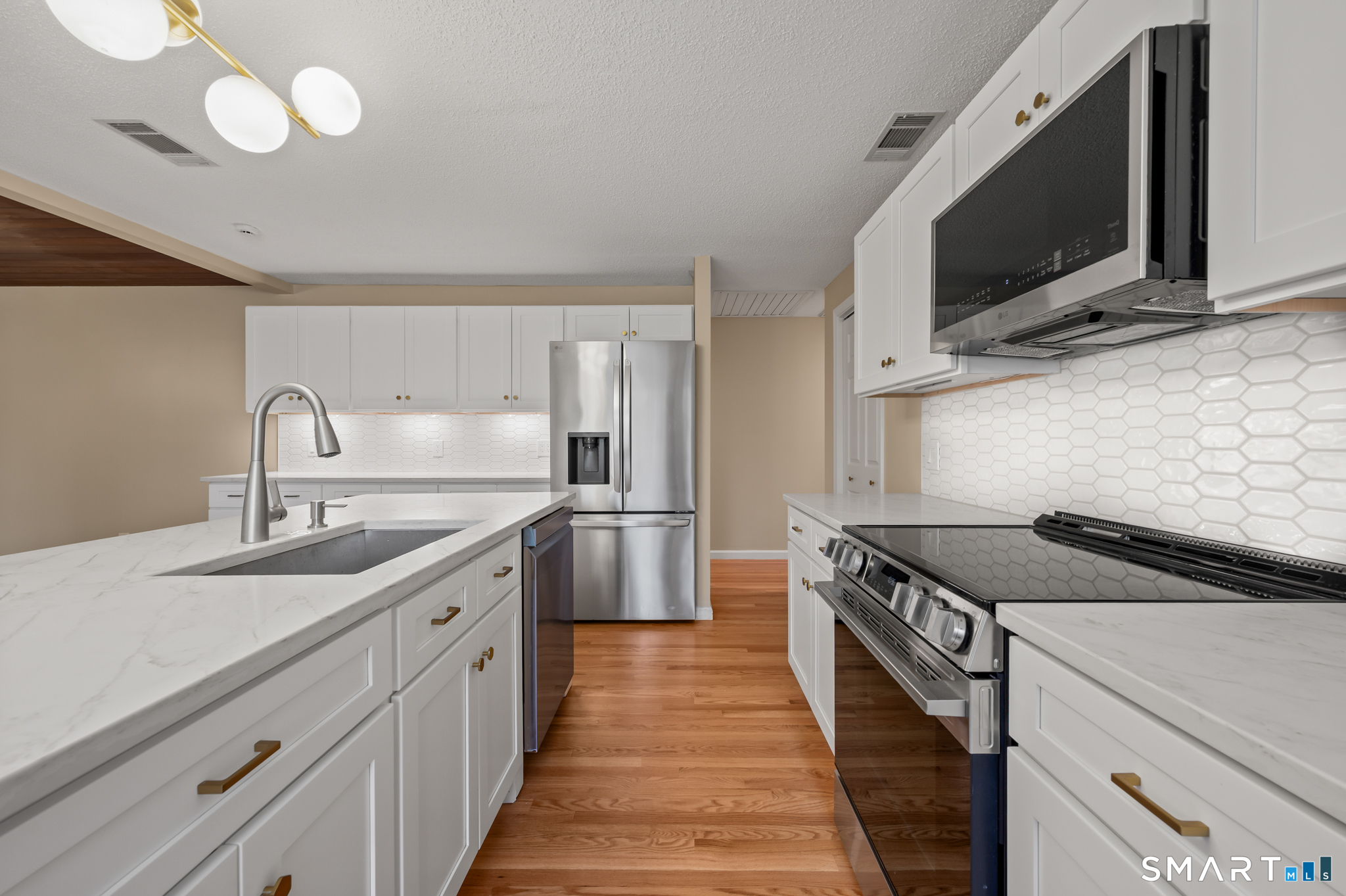 252 Blue Ridge Drive Manchester, CT 06040 - Photo 5 of 40 Stainless steel appliances and functional layout with ample prep and storage space.