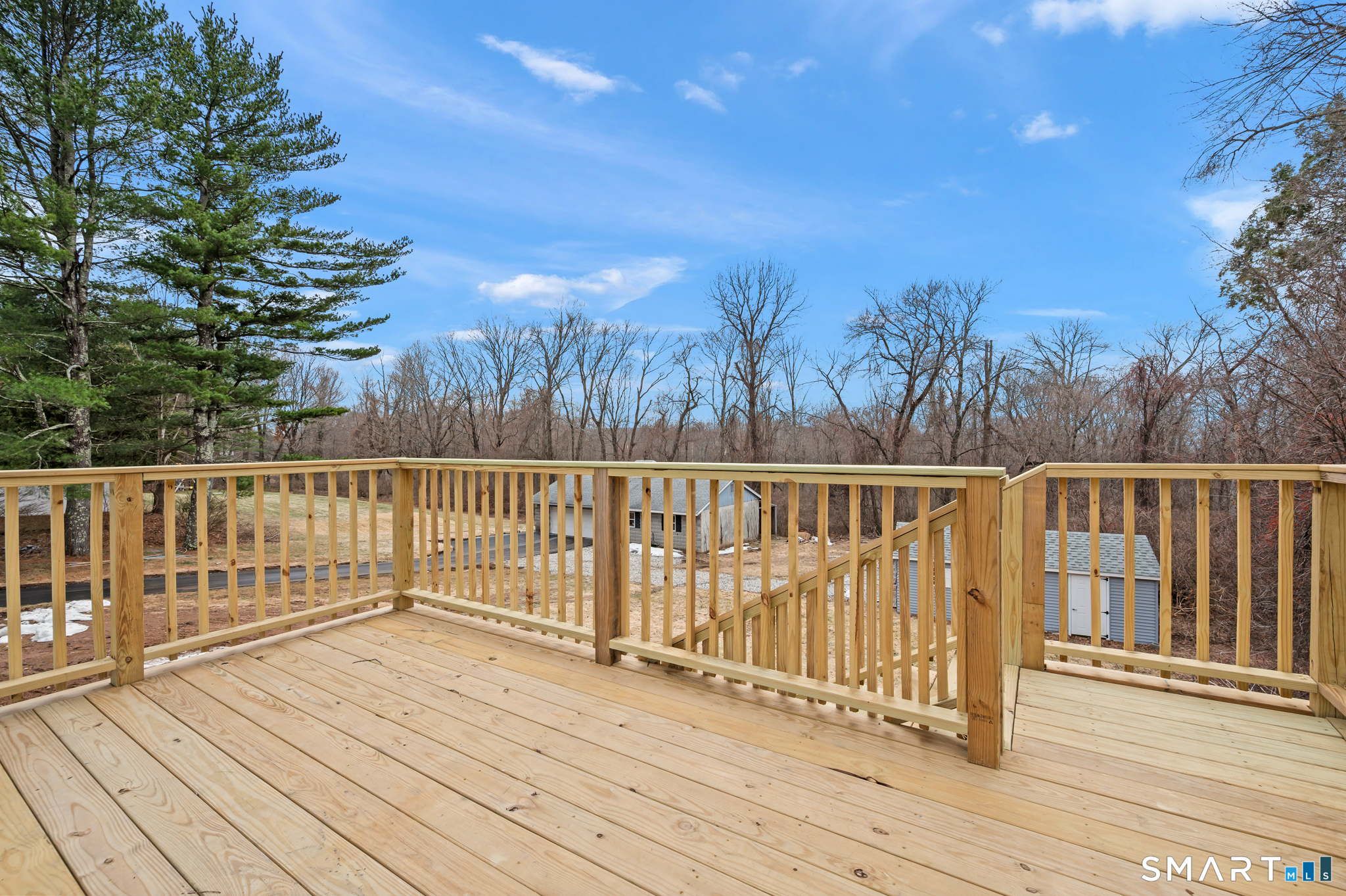 252 Blue Ridge Drive Manchester, CT 06040 - Photo 8 of 40 New deck overlooking private backyard setting.