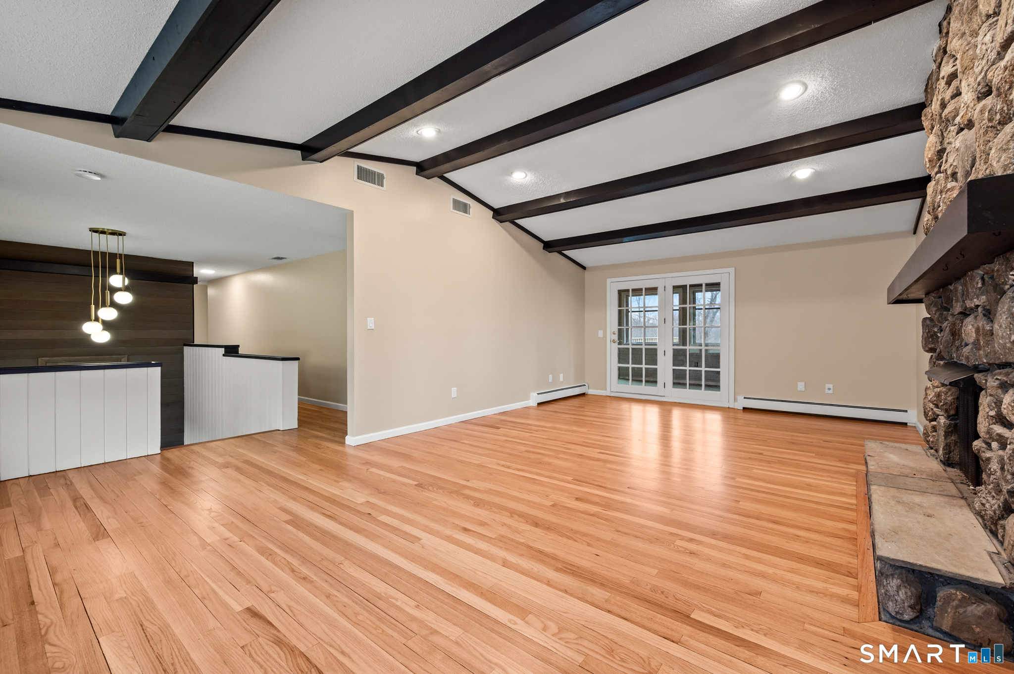 252 Blue Ridge Drive Manchester, CT 06040 - Photo 10 of 40 Alternate view highlighting open layout and architectural beam detail.