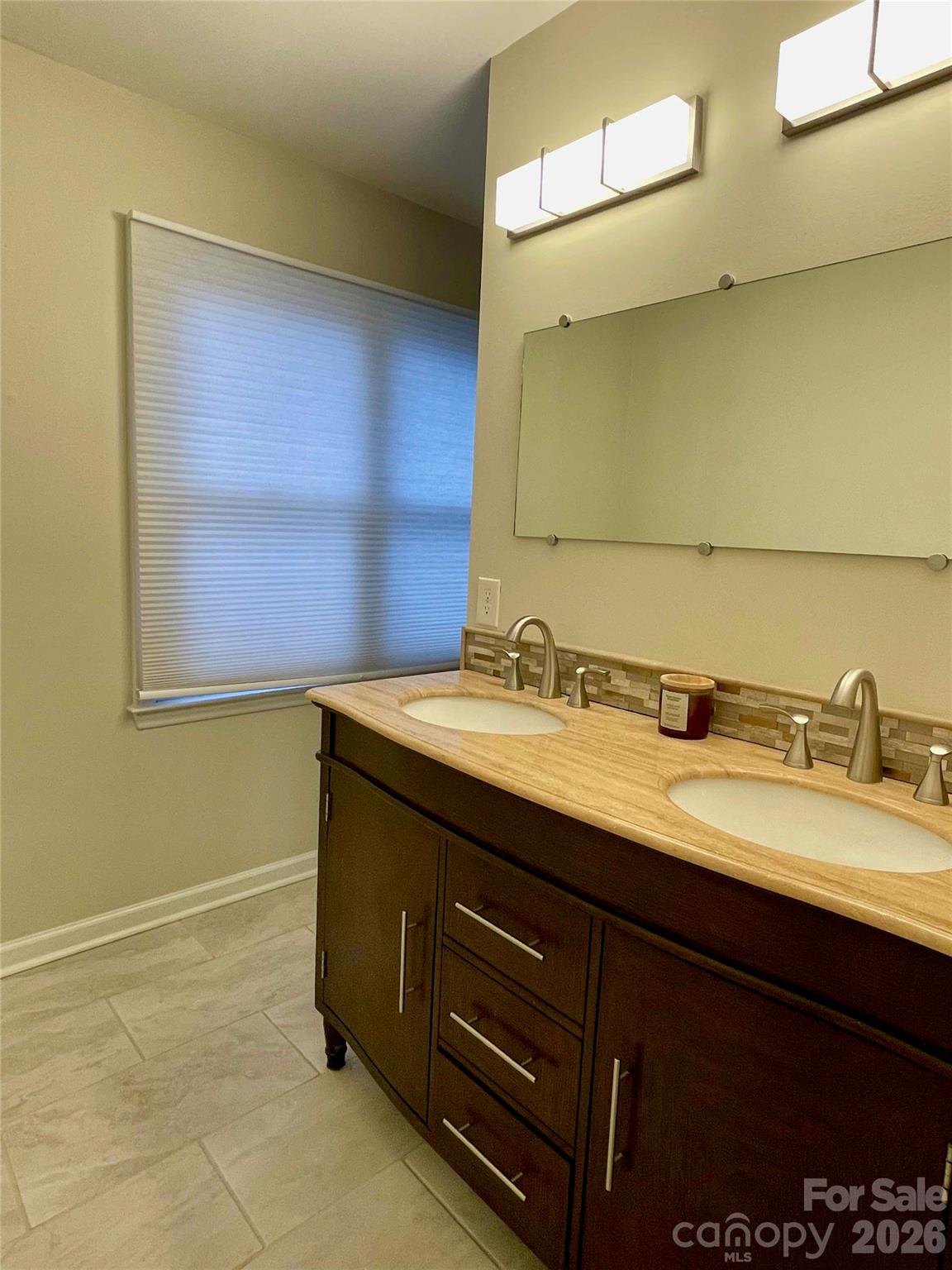 1330 5th Street Northeast, Unit 191 Hickory, NC 28601 - Photo 19 of 37 a bathroom with a granite countertop sink and a mirror