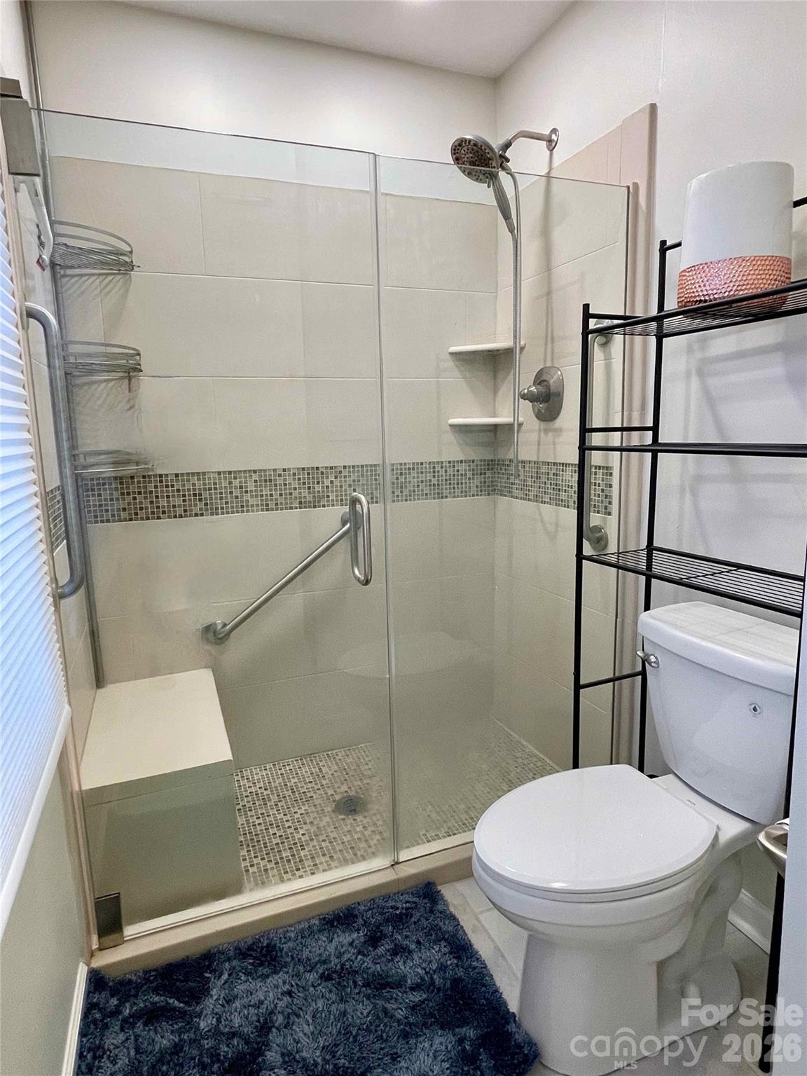 1330 5th Street Northeast, Unit 191 Hickory, NC 28601 - Photo 21 of 37 a bathroom with a toilet and a shower