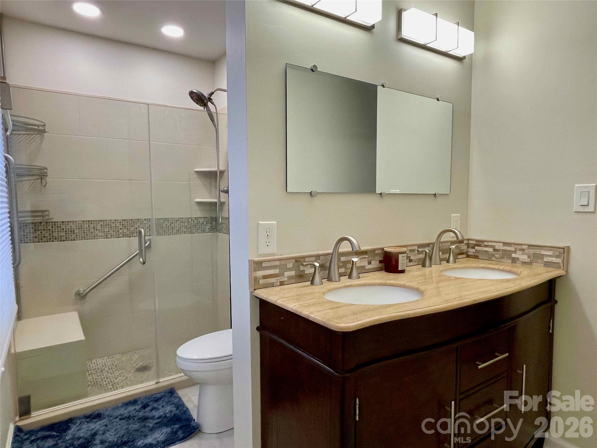 1330 5th Street Northeast, Unit 191 Hickory, NC 28601 - Photo 22 of 37 a bathroom with a sink and a mirror