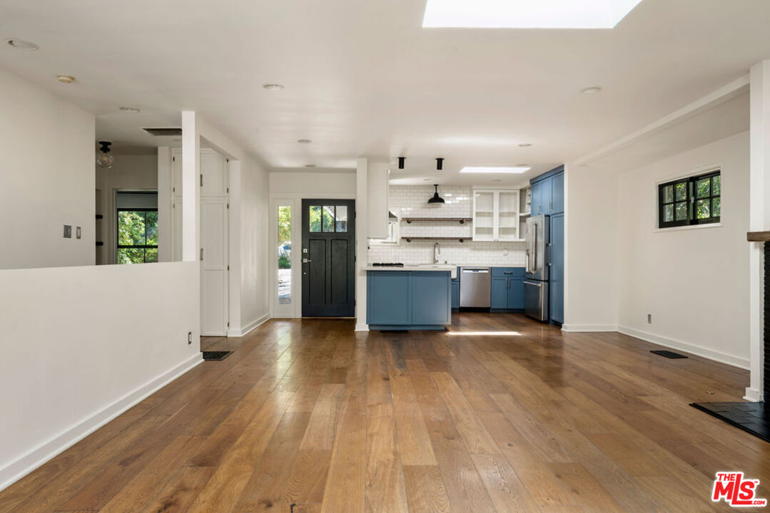 1530 Elevado Street Los Angeles, CA 90026 - Photo 13 of 44 a view of kitchen with wooden floor and electronic appliances