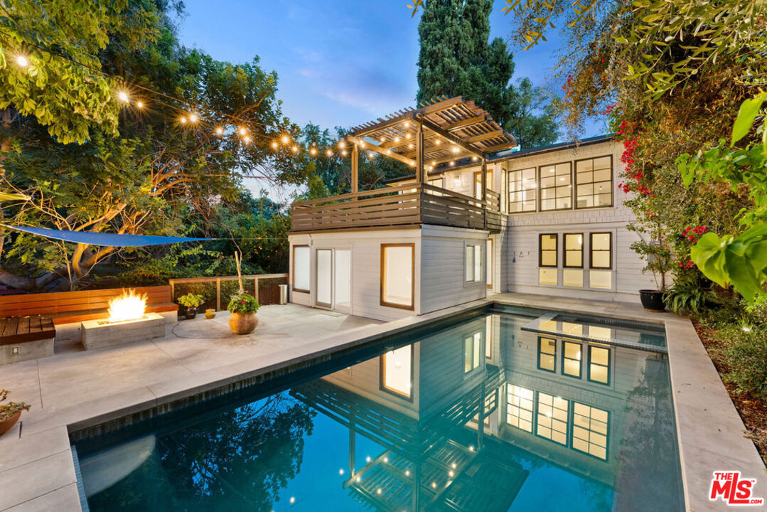 1530 Elevado Street Los Angeles, CA 90026 - Photo 2 of 44 a view of a house with pool and sitting area