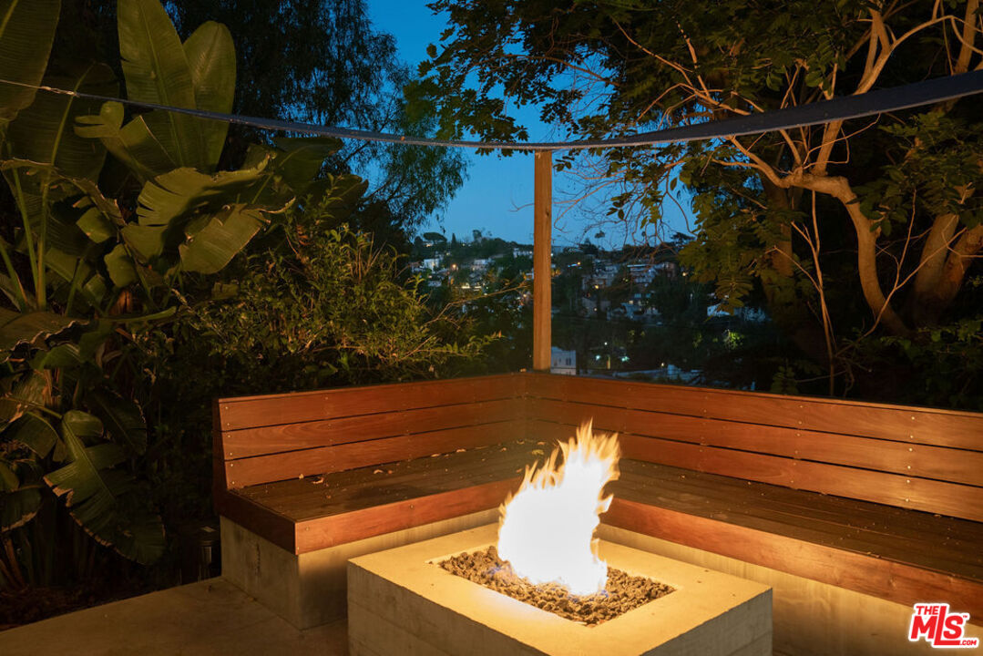 1530 Elevado Street Los Angeles, CA 90026 - Photo 6 of 44 a view of a flower in a yard