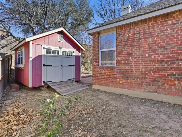 a view of backyard of house