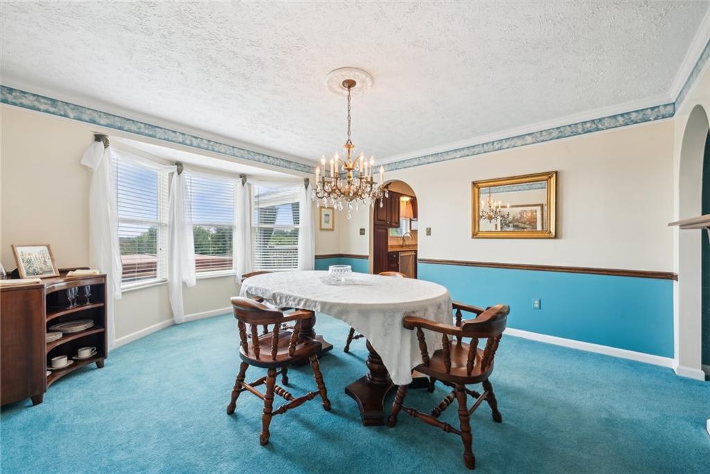 320 Talon Drive Irwin, PA 15642 - Photo 13 of 37 a dining room with furniture and window