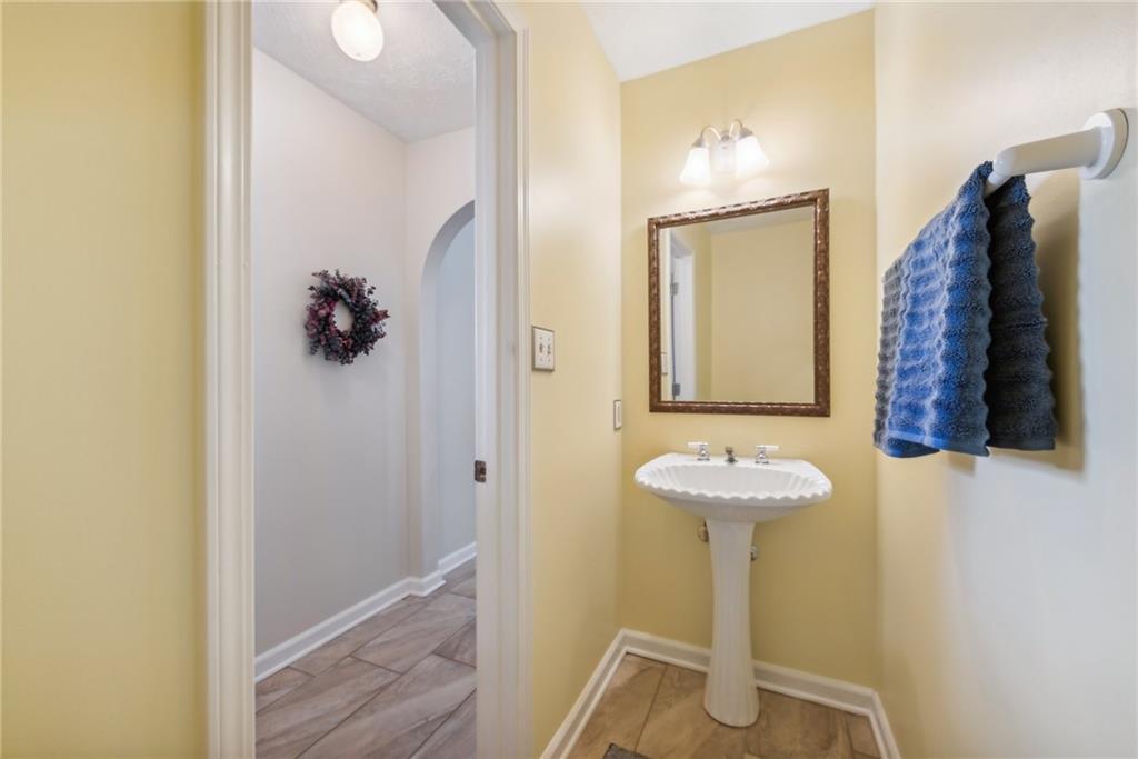 320 Talon Drive Irwin, PA 15642 - Photo 15 of 37 a bathroom with a sink and a mirror