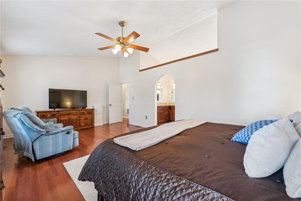 320 Talon Drive Irwin, PA 15642 - Photo 18 of 37 a bedroom with furniture and a flat screen tv