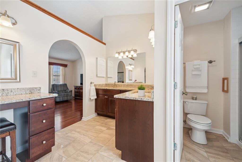 320 Talon Drive Irwin, PA 15642 - Photo 20 of 37 a large bathroom with a granite countertop sink a toilet and a mirror