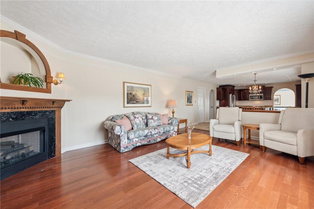 320 Talon Drive Irwin, PA 15642 - Photo 9 of 37 a living room with furniture and a fireplace