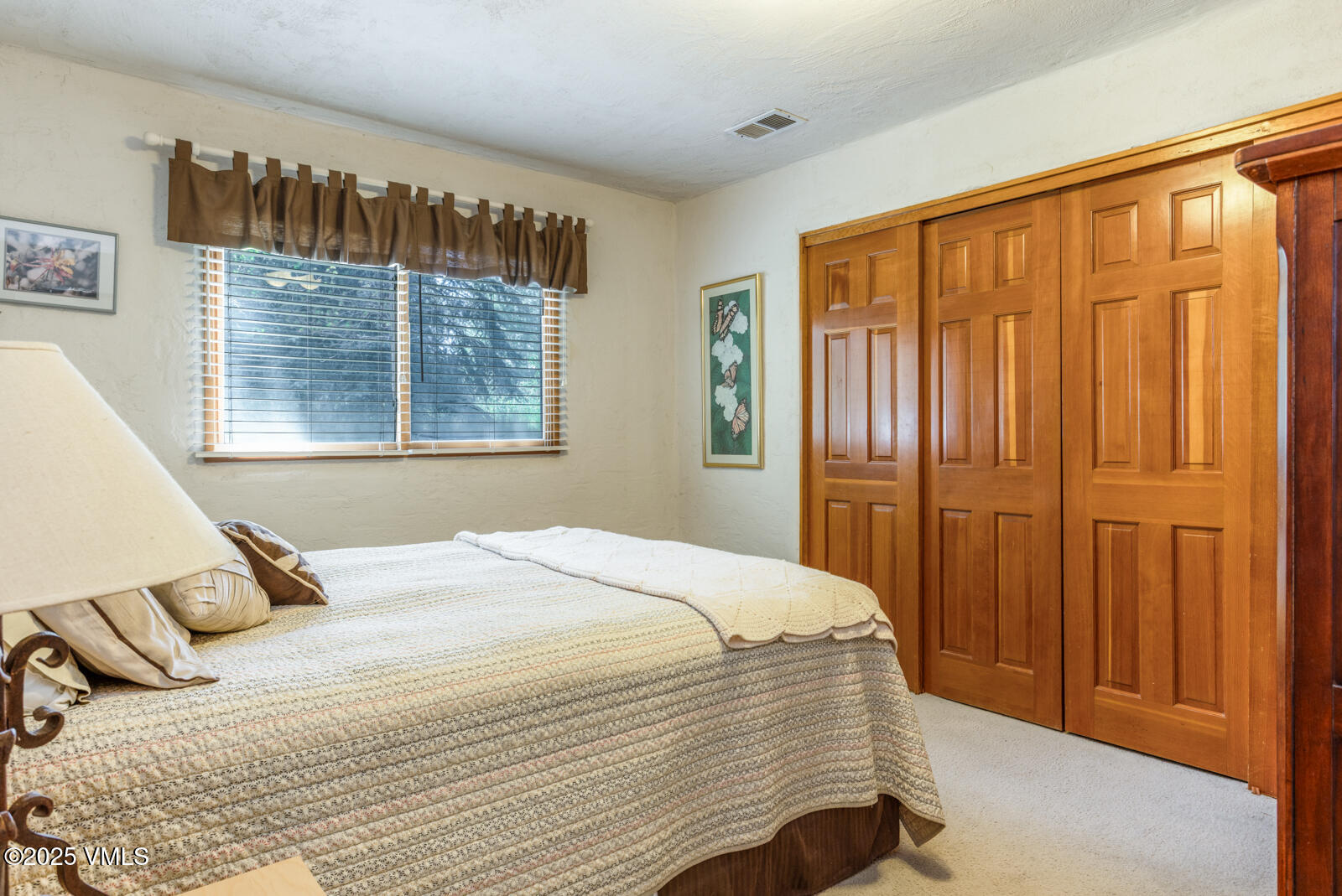 20 Hereford Road Edwards, CO 81632 - Photo 23 of 32 a bedroom with a bed and a window