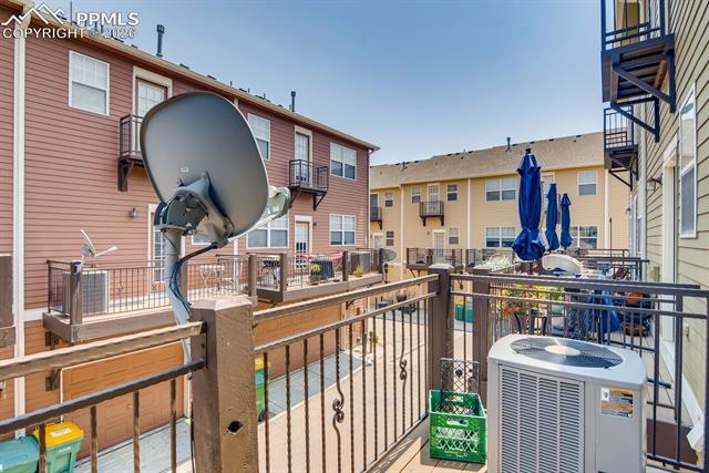 846 Victoria Ridge Point Colorado Springs, CO 80903 - Photo 24 of 27 Upper-level private deck featuring a metal railing system