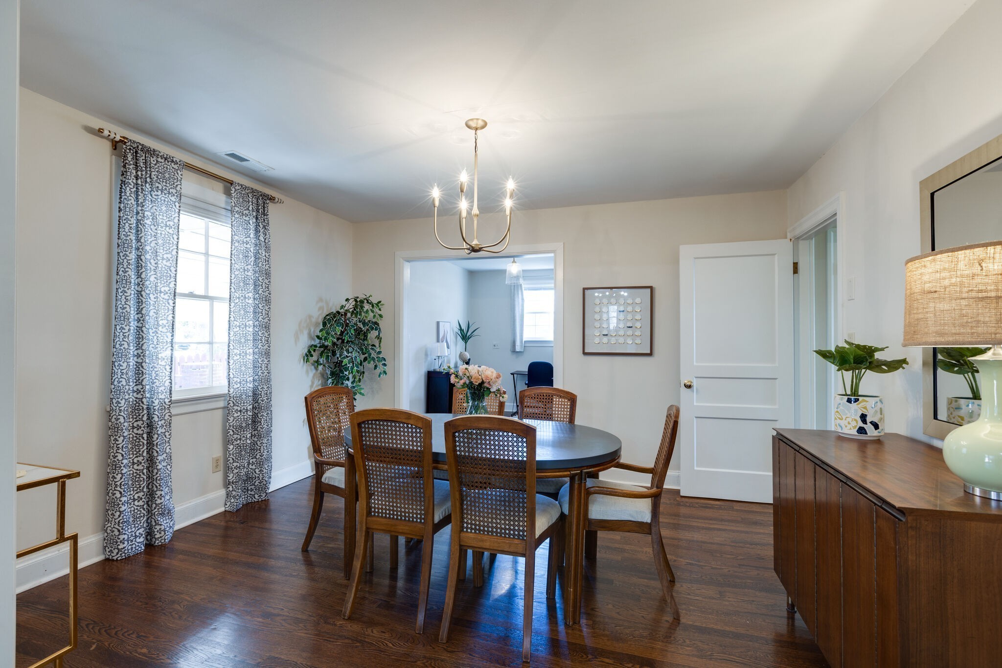 1335 Adams Street Franklin, TN 37064 - Photo 14 of 39 a view of a dining room with furniture window and wooden floor