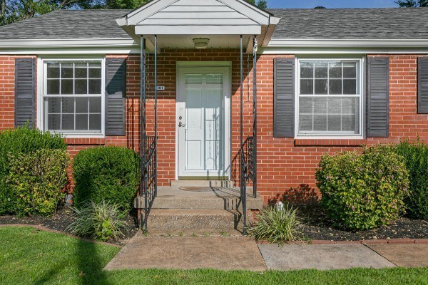 1335 Adams Street Franklin, TN 37064 - Photo 2 of 39 a front view of a house with garden