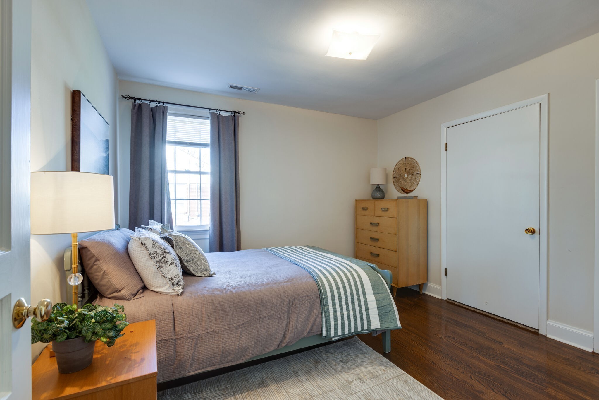 1335 Adams Street Franklin, TN 37064 - Photo 28 of 39 a bedroom with a bed and a window