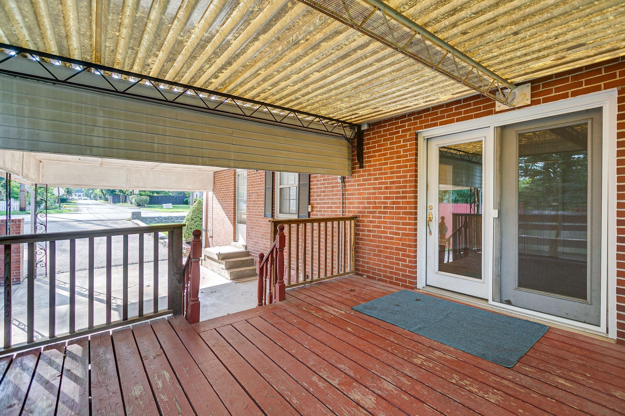 1335 Adams Street Franklin, TN 37064 - Photo 34 of 39 a porch with wooden floor in front of house