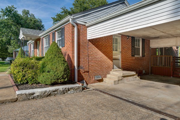 1335 Adams Street Franklin, TN 37064 - Photo 5 of 39 a view of a house with a small yard and plants