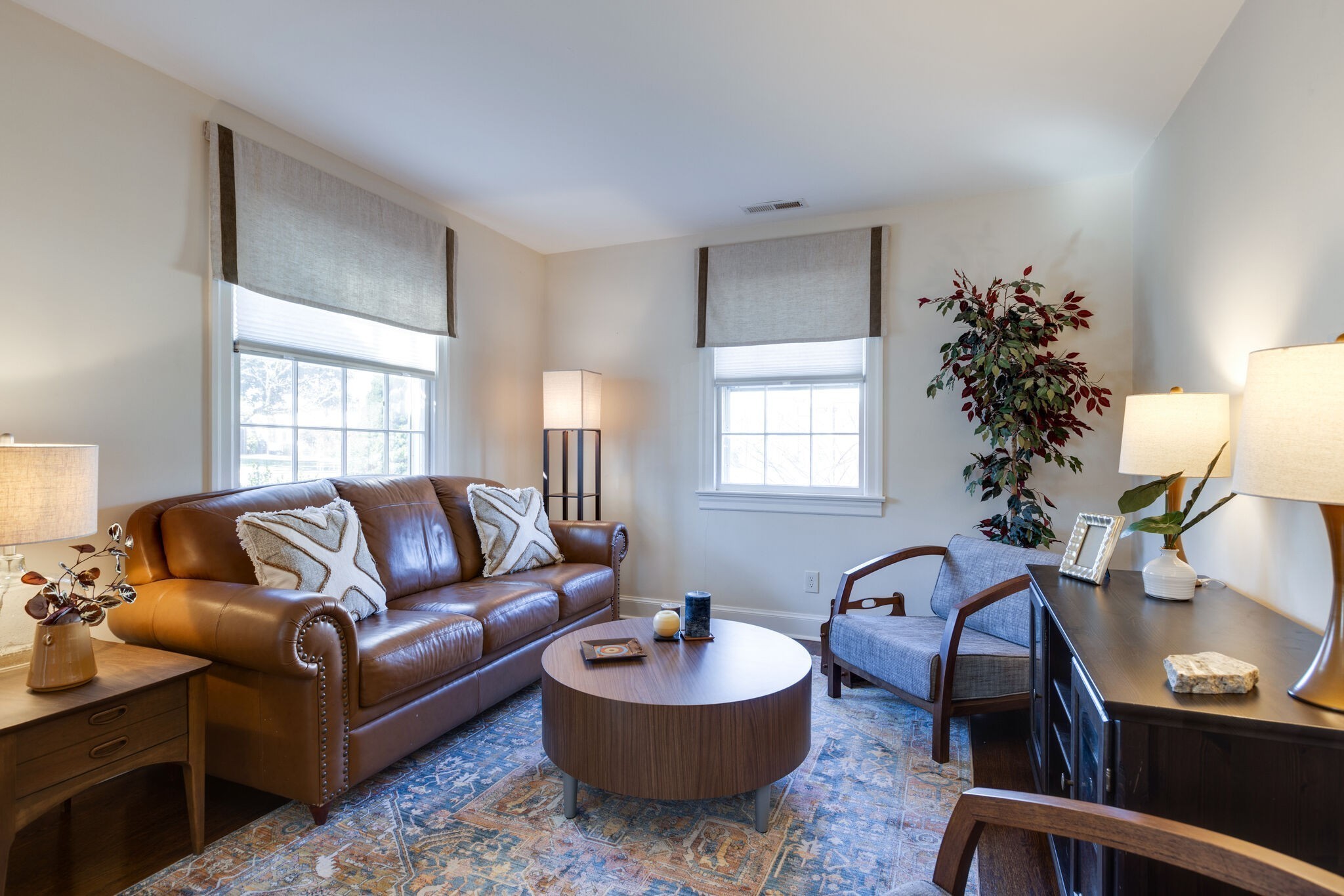 1335 Adams Street Franklin, TN 37064 - Photo 6 of 39 a living room with furniture and a potted plant