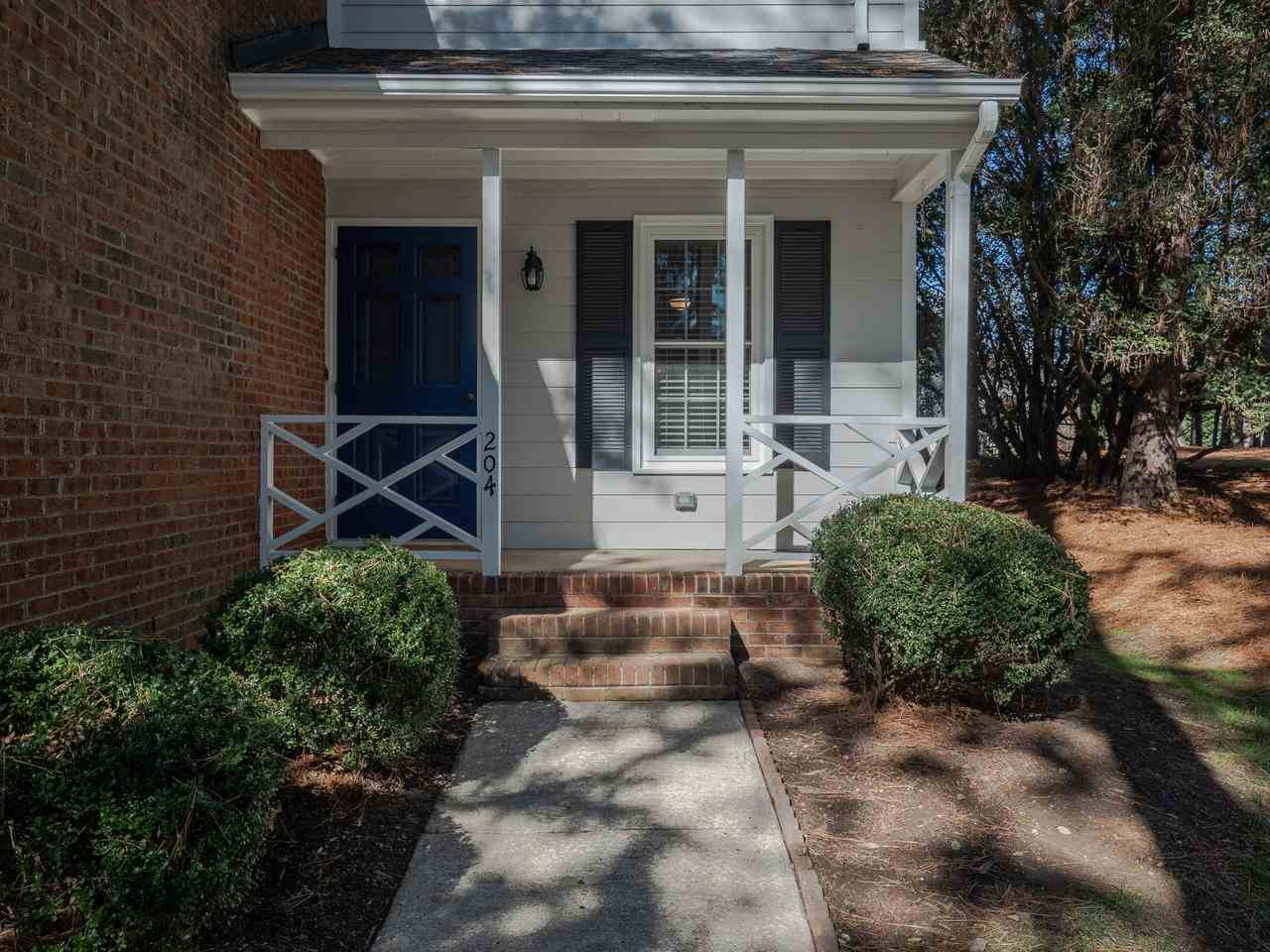 204 Wetherburn Lane Raleigh, NC 27615 - Photo 2 of 19 Charming front porch and end unit