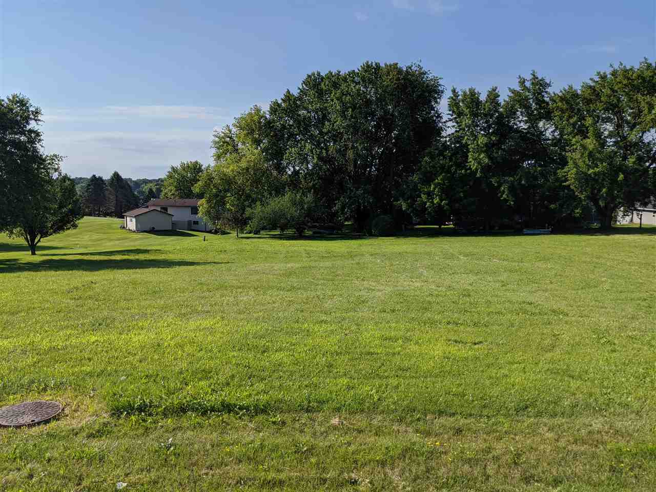 949 Lake Summerset Road Lake Summerset, IL 61019 - Photo 1 of 14 a view of a field with an trees